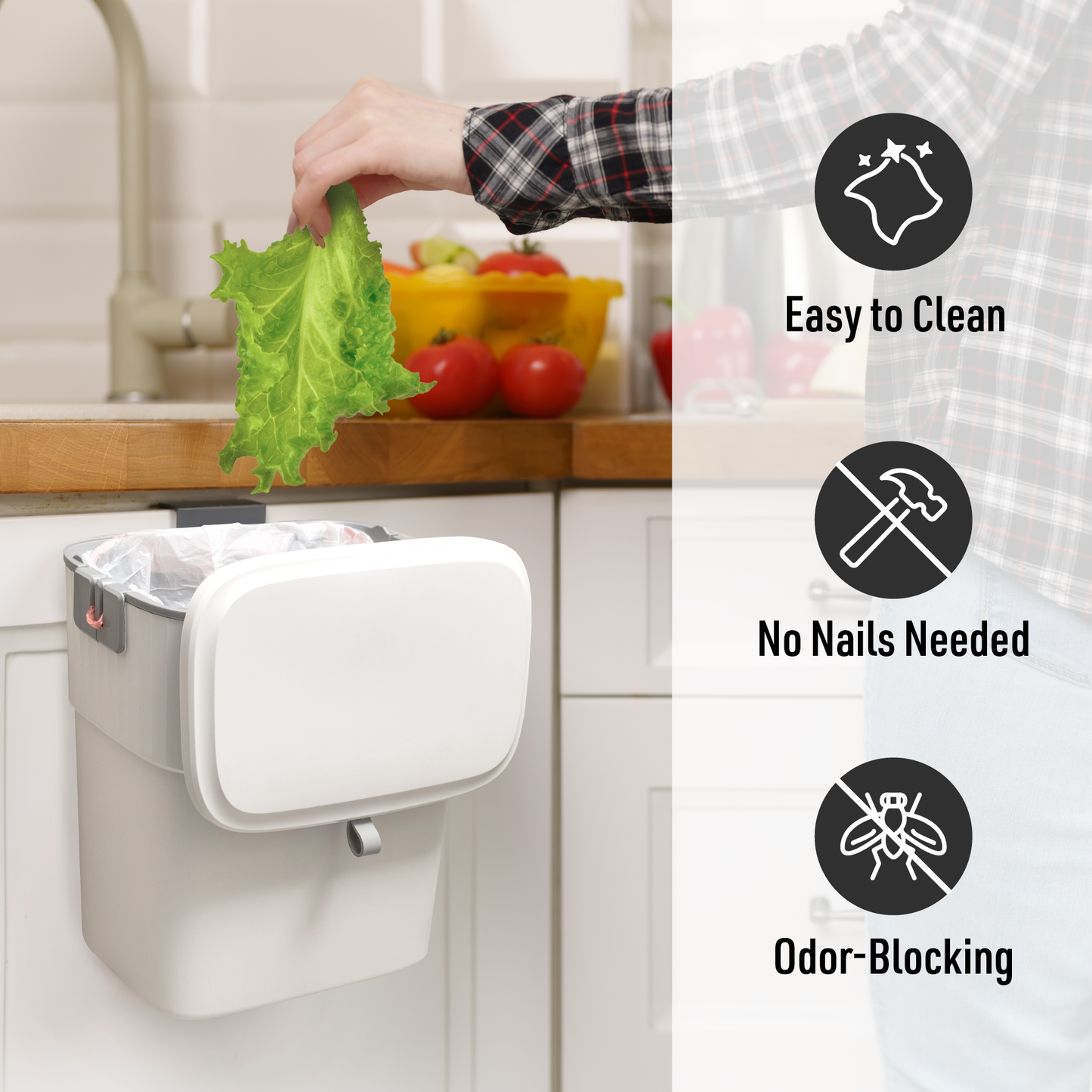 person throwing lettuce into hanging trash can