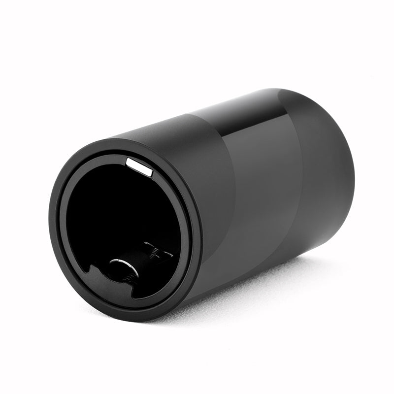 a black cylindrical object with a white background