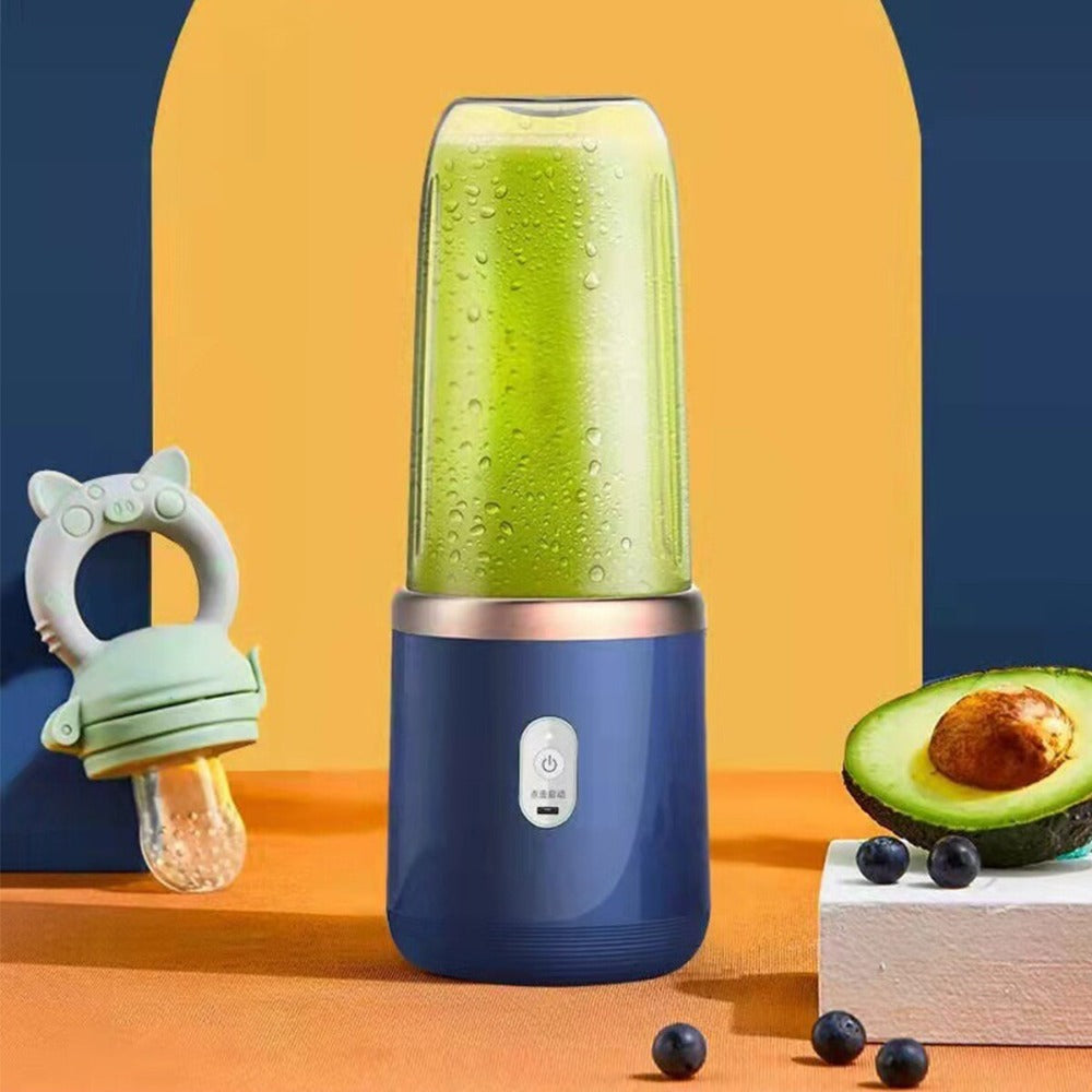 a blender with a green liquid in it