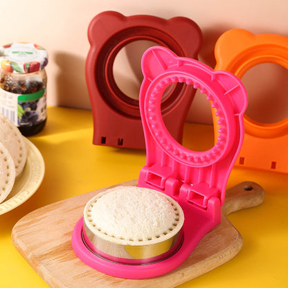 a pink and orange round shaped cookie cutter