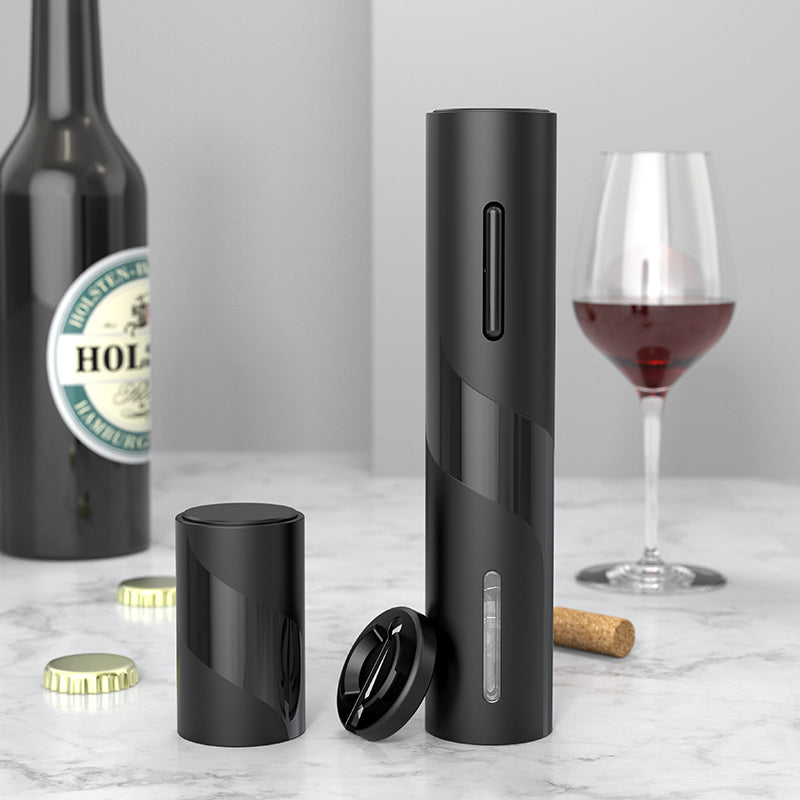 a black cylinder with a cork and a bottle of wine with text: 'HOL'