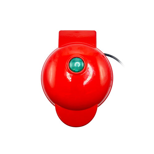 a red object with a green light
